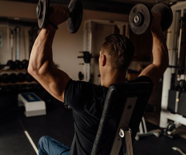 Man focusing before a workout, calm and collected.